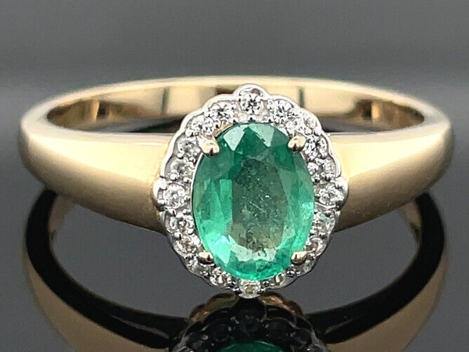 RING AUS 375/- GELBGOLD mit Sambia Smaragd und Zirkon (ca. 1,04 ct.)