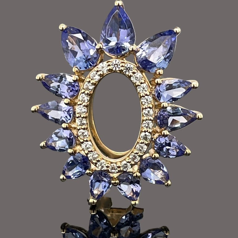 ANHÄNGER AUS 375/- GELBGOLD MIT TANSANIT & ZIRKON ( GES. CA. 3,014 ct.)
