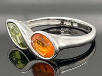 RING AUS 950/- PLATIN MIT PERIDOT & FEUEROPAL