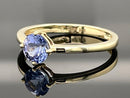 RING AUS 375/- GELBGOLD MIT TANSANIT (CA.0,81 ct.)