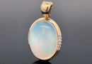 ANHÄNGER AUS 585/- GELBGOLD mit Kristallopal und Brillanten (ca. 9,10 ct.)