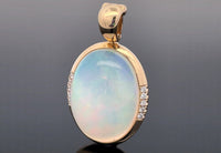 ANHÄNGER AUS 585/- GELBGOLD mit Kristallopal und Brillanten (ca. 9,10 ct.)