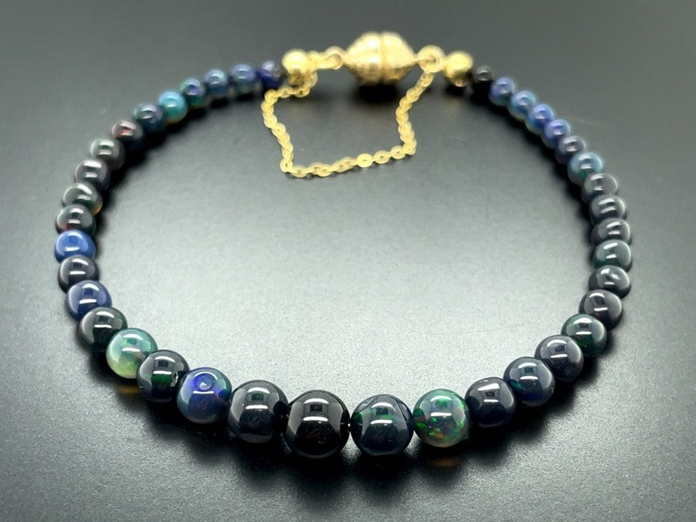 ARMBAND 375/- GELBGOLD mit Kristallopal (beh.) (ca. 12,000 ct.)
