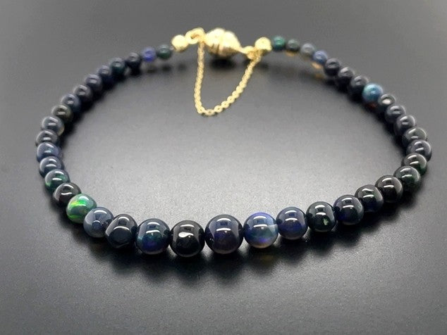 ARMBAND 375/- GELBGOLD mit Kristallopal (beh.) (ca. 12,000 ct.)