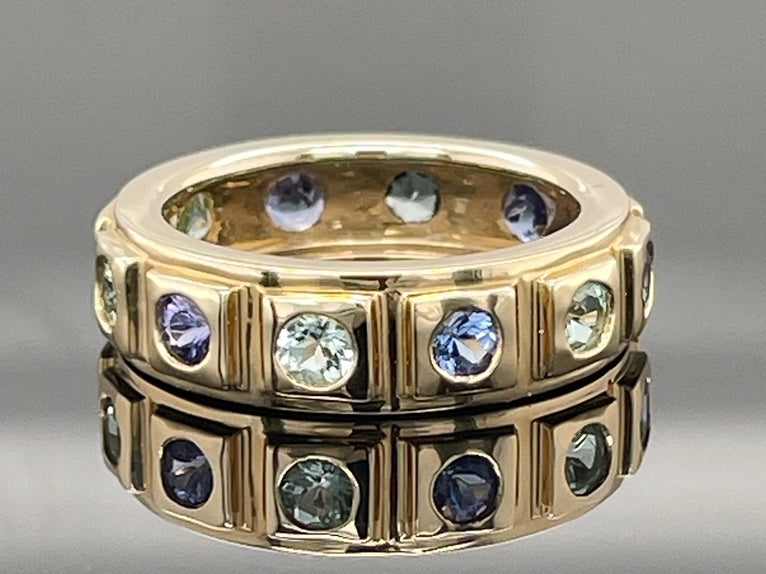 RING AUS 585/- GELBGOLD MIT PARAIBA-TURMALIN & TANSANIT AAA