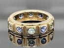 RING AUS 585/- GELBGOLD MIT PARAIBA-TURMALIN & TANSANIT AAA