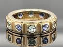 RING AUS 585/- GELBGOLD MIT PARAIBA-TURMALIN & TANSANIT AAA