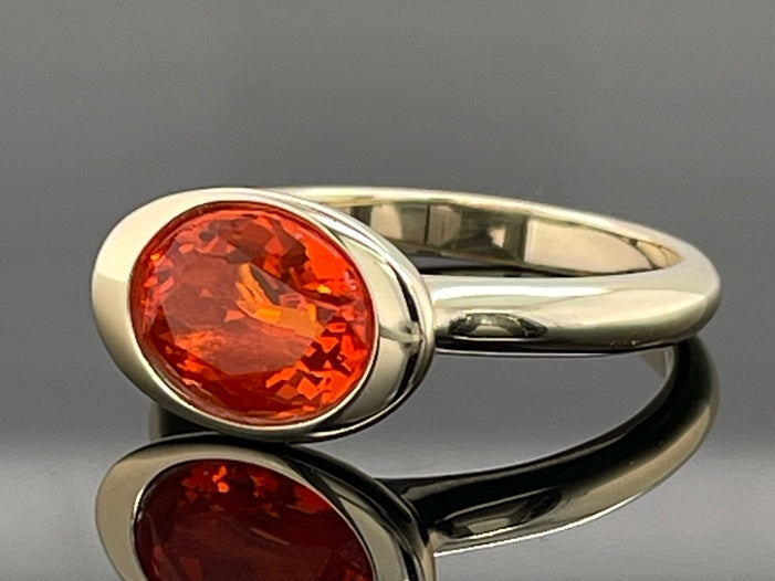 RING AUS 375/- GELBGOLD MIT FEUEROPAL (CA.1,10 ct.)