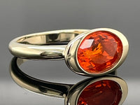 RING AUS 375/- GELBGOLD MIT FEUEROPAL (CA.1,10 ct.)