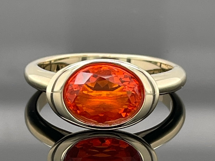 RING AUS 375/- GELBGOLD MIT FEUEROPAL (CA.1,10 ct.)