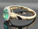 RING AUS 375/- GELBGOLD mit Sambia Smaragd und Zirkon (ca. 1,04 ct.)