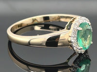 RING AUS 375/- GELBGOLD mit Sambia Smaragd und Zirkon (ca. 1,04 ct.)