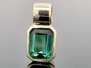 ANHÄNGER AUS 375/- GELBGOLD MIT GOLKONDA TURMALIN (CA. 1,10 ct.)