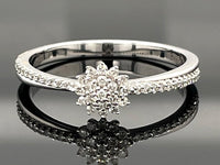 RING AUS 375/- WEIßGOLD MIT DIAMANTEN  (GES. CA. 0,25 ct.)