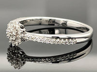 RING AUS 375/- WEIßGOLD MIT DIAMANTEN  (GES. CA. 0,25 ct.)