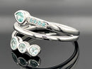 RING GR.17 (53) AUS 585/- WEIßGOLD MIT PARAIBA-TURMALIN (GES. CA.0,340 ct.)
