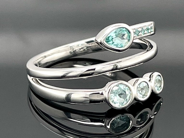 RING GR.17 (53) AUS 585/- WEIßGOLD MIT PARAIBA-TURMALIN (GES. CA.0,340 ct.)