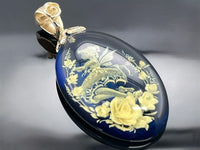 CLIP ANHÄNGER AUS 375/- GELBGOLD MIT BERNSTEIN BEH. (CA. 13,57 ct.)