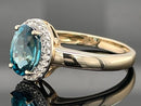 RING AUS 375/- GELBGOLD MIT ZIRKON BLAU & WEIß (ges.ca.3,07 ct.)
