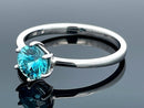 RING GR.19 (60) AUS 375/- WEIßGOLD MIT ZIRKON BLAU ( CA. 1,80 ct.)