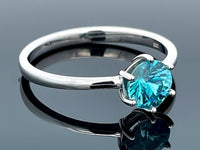 RING GR.19 (60) AUS 375/- WEIßGOLD MIT ZIRKON BLAU ( CA. 1,80 ct.)
