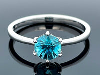 RING GR.19 (60) AUS 375/- WEIßGOLD MIT ZIRKON BLAU ( CA. 1,80 ct.)