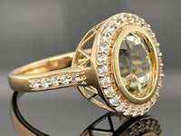 RING AUS 375/- GELBGOLD MIT HIDDENIT & ZIRKON (ges. ca. 4,79ct.)