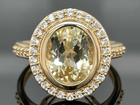 RING AUS 375/- GELBGOLD MIT HIDDENIT & ZIRKON (ges. ca. 4,79ct.)