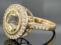 RING AUS 375/- GELBGOLD MIT HIDDENIT & ZIRKON (ges. ca. 4,79ct.)