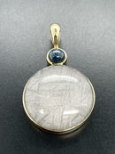 ANHÄNGER AUS 375/- GELBGOLD MIT METEORIT/BERGKRISTALL-DUBL. BEH. & STERNSAPHIR BEH.