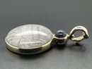 ANHÄNGER AUS 375/- GELBGOLD MIT METEORIT/BERGKRISTALL-DUBL. BEH. & STERNSAPHIR BEH.
