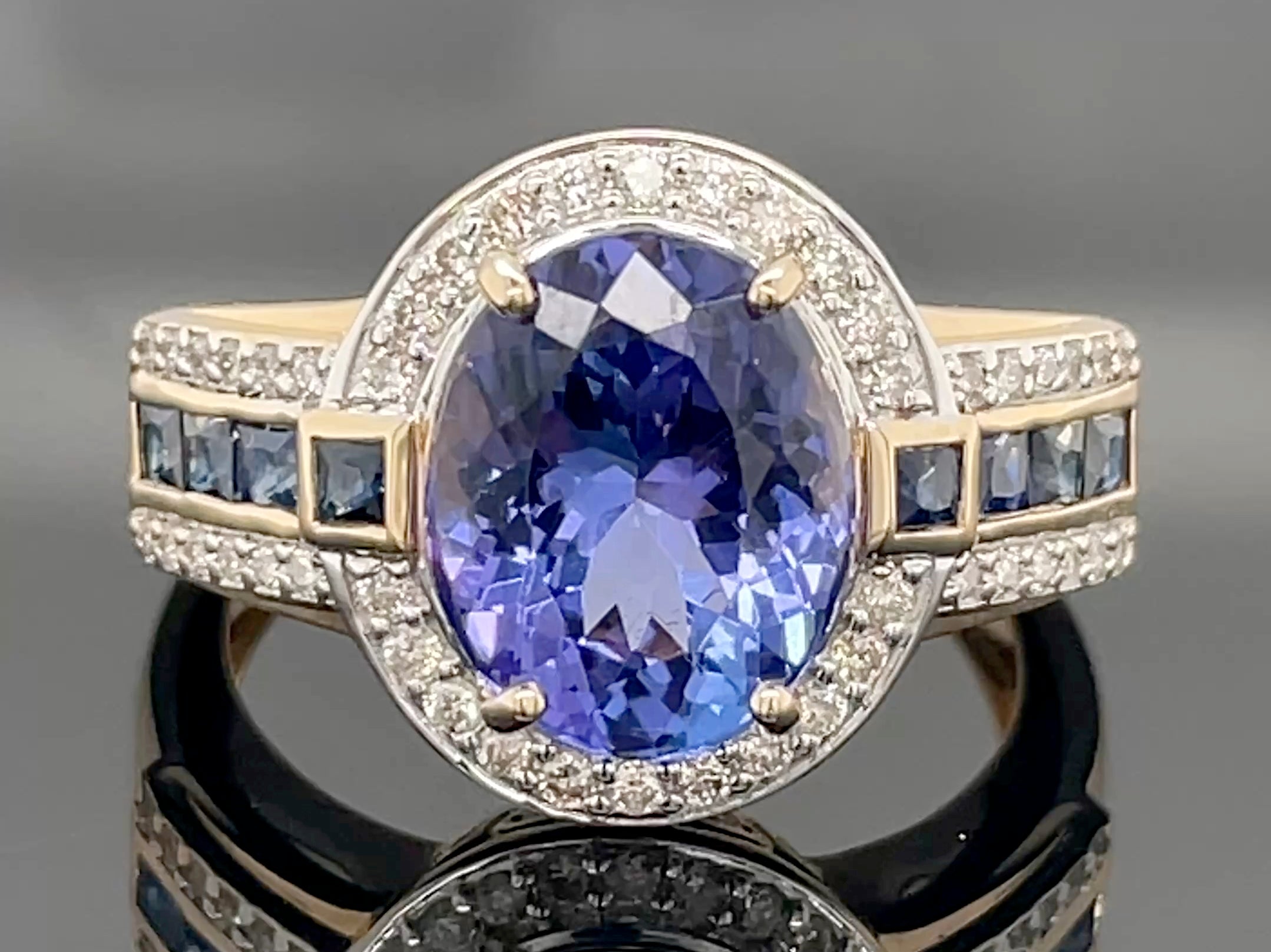 RING  AUS 585/- GELBGOLD MIT TANSANIT AAAA+, SAPHIR & BRILLANTEN