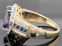 RING  AUS 585/- GELBGOLD MIT TANSANIT AAAA+, SAPHIR & BRILLANTEN