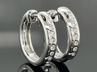 CREOLEN AUS 585/- WEIßGOLD MIT BRILLANTEN SI (GES. CA. 0,24 ct.)
