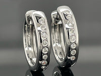 CREOLEN AUS 585/- WEIßGOLD MIT BRILLANTEN SI (GES. CA. 0,24 ct.)