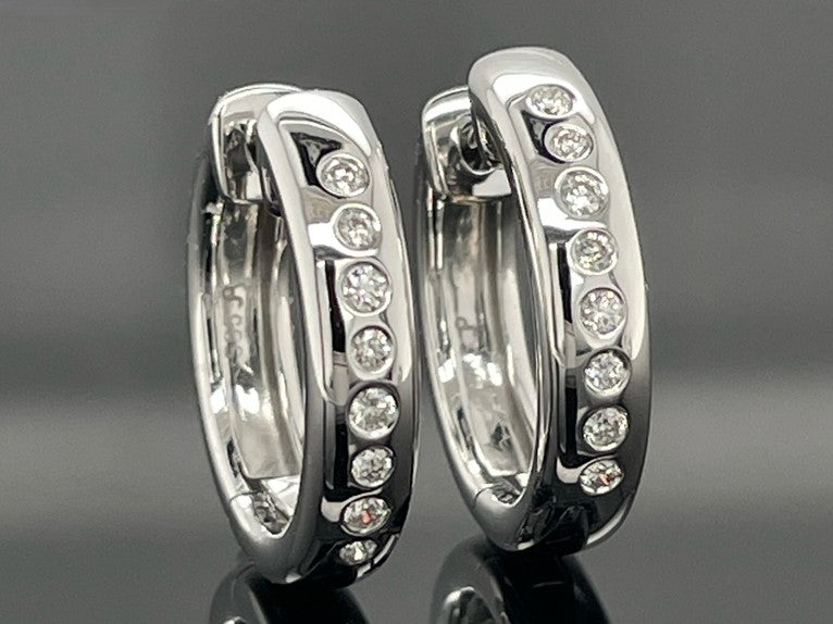 CREOLEN AUS 585/- WEIßGOLD MIT BRILLANTEN SI (GES. CA. 0,24 ct.)