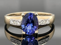 RING AUS 375/- GELBGOLD MIT TANSANIT AAAA & BRILLANTEN (GES.CA. 1,56ct.)