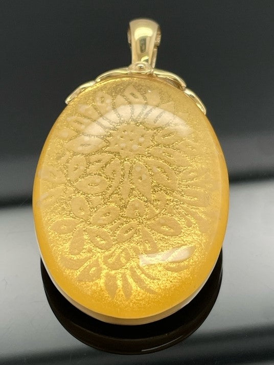 CLIP ANHÄNGER AUS 375/- GELBGOLD MIT BERGKRISTALL/BLATTGOLD-DUBL. BEH.