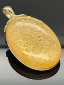 CLIP ANHÄNGER AUS 375/- GELBGOLD MIT BERGKRISTALL/BLATTGOLD-DUBL. BEH.