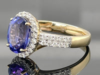 RING AUS 585/- GELBGOLD MIT TANSANIT AAAA (CA. 2,90 ct.) & BRILLANTEN (GES. CA. 0,50 ct.)
