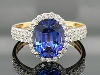 RING AUS 585/- GELBGOLD MIT TANSANIT AAAA (CA. 2,90 ct.) & BRILLANTEN (GES. CA. 0,50 ct.)