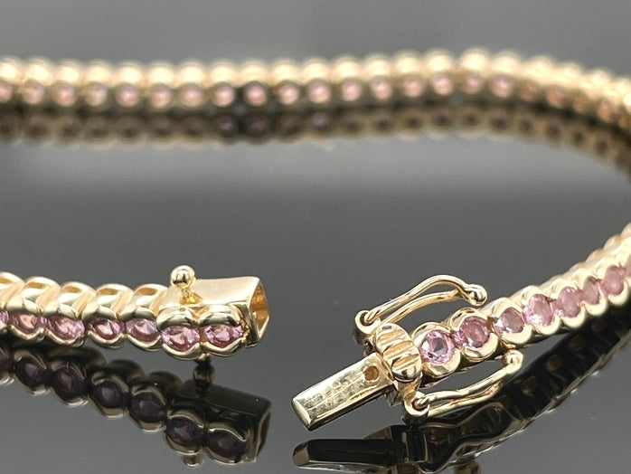 ARMBAND AUS 585/- GELBGOLD MIT PADPARADSCHA SAPHIR (GES.CA. 4,62 ct.)