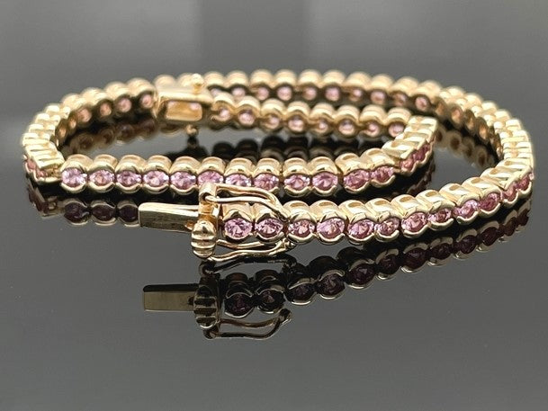 ARMBAND AUS 585/- GELBGOLD MIT PADPARADSCHA SAPHIR (GES.CA. 4,62 ct.)