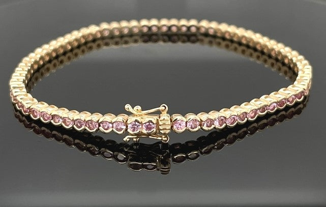 ARMBAND AUS 585/- GELBGOLD MIT PADPARADSCHA SAPHIR (GES.CA. 4,62 ct.)
