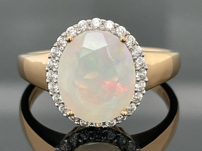 RING AUS 925/- SILBER VERGOLDET MIT ÄTHIOP. OPAL & ZIRKON