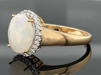 RING AUS 925/- SILBER VERGOLDET MIT ÄTHIOP. OPAL & ZIRKON