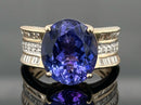 RING GR.16 (50) AUS 585/- GELBGOLD MIT TANSANIT AAAAA & BRILLANTEN (GES. CA. 0,55ct.)
