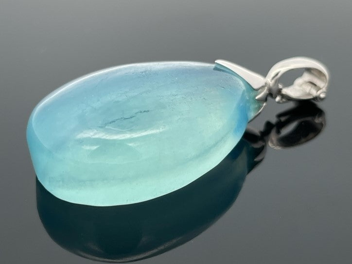 CLIP ANHÄNGER AUS 925/- SILBER RHODINIERT MIT MILKY AQUAMARIN (CA.31,0 ct.)