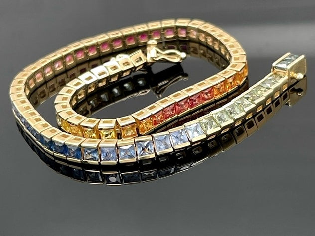 ARMBAND AUS 375/- GELBGOLD MIT MULTI SAPHIR (GES.CA. 7,92 ct.)