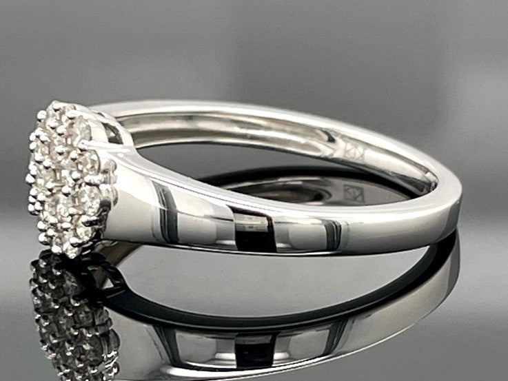 RING AUS 375/- WEIßGOLD MIT BRILLANTEN  (GES. CA. 0,30 ct.)
